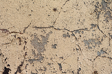 Texture of a concrete wall with cracks and scratches which can be used as a background