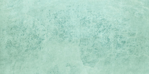 Obraz premium Pastel blue green background texture with grunge and old distressed and weathered rock or stone overlay design