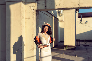 Stylish young girl in an autumn look