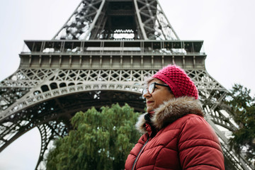 Woman visiting Tour Eiffel in Paris, France