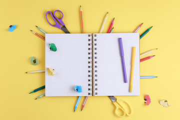 notebook on a yellow isolated background, office supplies