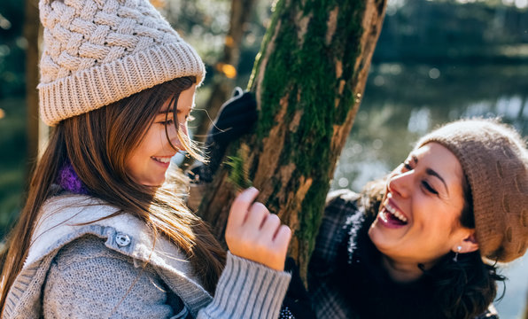 Mother and daughter outdoors
