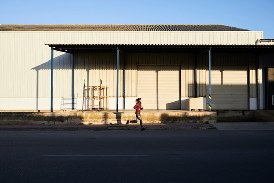 Runner in industrial zone.