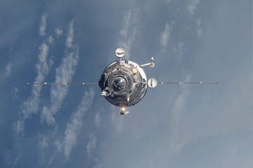 The spacecraft is docking. Elements of this image were furnished by NASA
