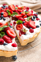 Tasty berry pie on grey background, closeup