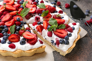 Tasty berry pie on grey background, closeup