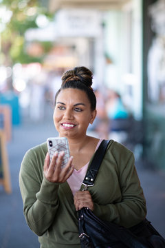pretty indigenous australian with phone