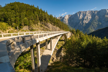 mountain road on the bridge over the precipice in the Julian Alps on the Predil pass