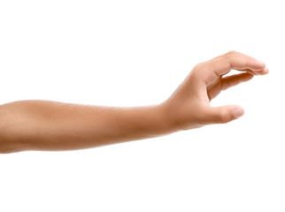 Child's hand holding something on white background