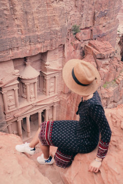 Tourist exploring Jordanian ancient city Petra