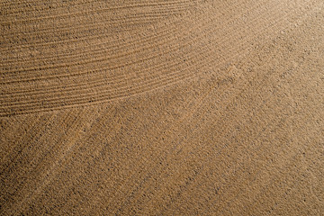 plowed field in spring aerial photography