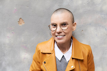 Cheerful hairless woman portrait.