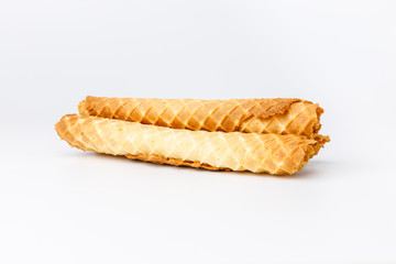 Baked waffles with yellow fruit filling on white background