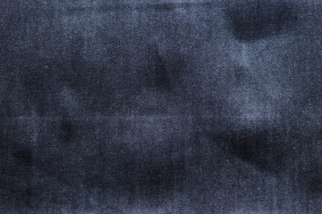 Naklejka premium close-up view dark blue jeans for background. denim texture