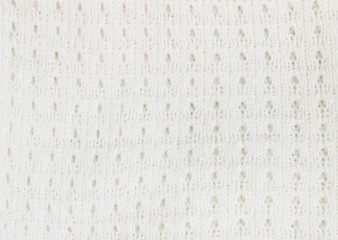 Closeup of white knitting fabric