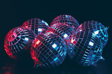 Mirror balls Illuminating in the dark close up