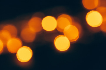 Abstract Gold bokeh sparkle on dark  background