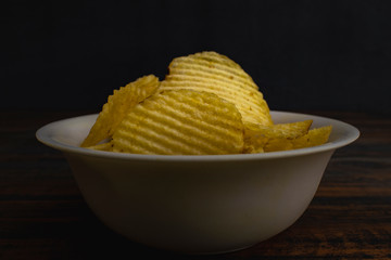 Closeup of chips placed in a white color bowle