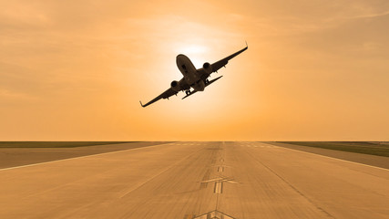 Fototapeta na wymiar Airplane taking off from runway
