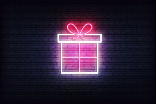 Gift box neon icon. Glowing Christmas winter holiday icon sign