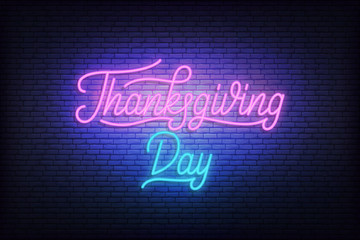 Thanksgiving Day neon. Glowing lettering sign for Thanksgiving celebration