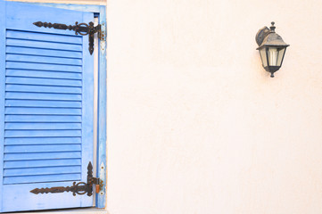 old wooden window closed shutters. mediterranean house