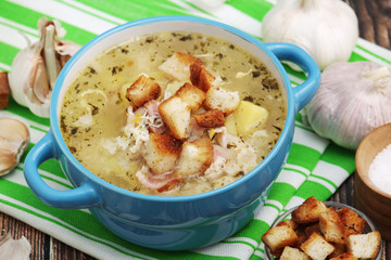 A bowl with traditional Czech garlic soup cesnecka