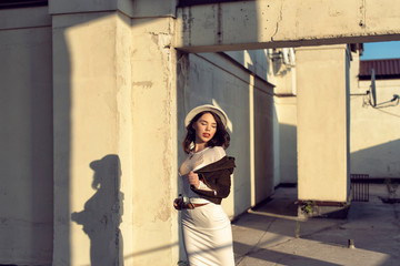 Stylish young girl in an autumn look
