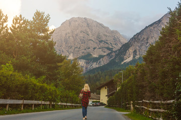 Naklejka premium girl in the mountains, alps, austria