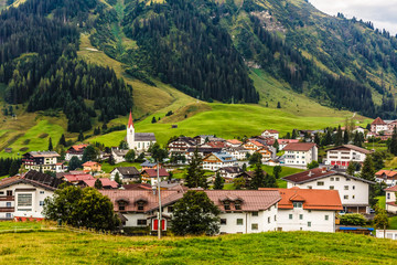 Obraz premium Mountain valley village landscape summer
