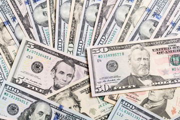 50 dollar bill on various US Dollar billss Top view of business concept on background with copy space
