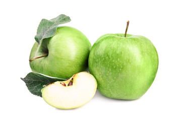 Fresh ripe green apples with leaves on white background
