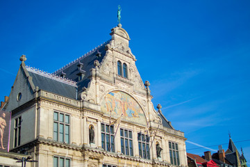 Fototapeta na wymiar Facade of Nederlands Toneel Gent (NTGent or NTG), a famous theatre in Sint-Baafsplein square, in Ghent, Belgium