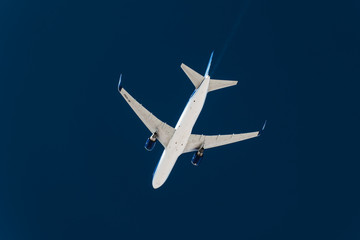 Airliner with contrails