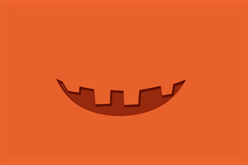 Halloween concept. Jack Lantern smile on pumpkin color background. Copy space for your text.