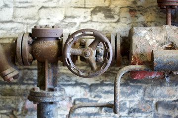 Weathered and rusted pipe valve 