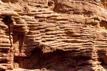 Coloured Canyon is a rock formation on South Sinai (Egypt) peninsula. Desert rocks of multicolored sandstone background.	