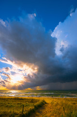 Fast weather change after days rather boring weather. Welcomed by the people. Baltic Sea in summer. People did not even shy away from approaching lightning and thunder. (The photographer fled...)