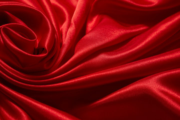 Luxury red satin smooth fabric background for celebration, ceremony, event invitation card or advertising poster