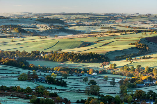 View from Curbar Edge at sunrise in autumn, looking south towards Baslow and Chatsworth, Peak District National Park, Derbyshire