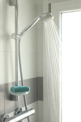 shower box with open running water flowing and copy space for your text