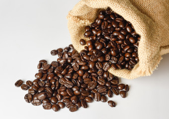 coffee beans in bag on white background