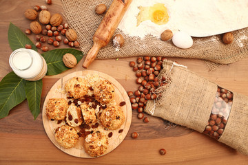 Cookie with ingredients on the wooden table