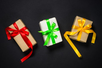 Present boxes on black background.