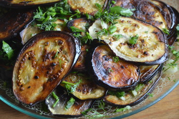 Moldovan fried eggplant with herbs and garlic. Cold appetizer