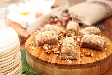 Sweet with ingredients on the wooden table