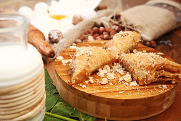 Sweet with ingredients on the wooden table
