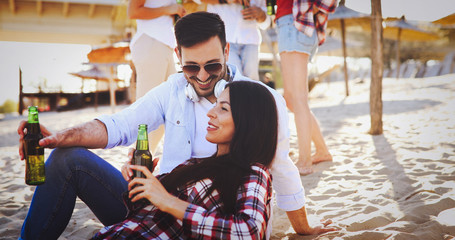 Young couple having fun at the beach