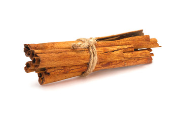 Close-up of Cinnamon sticks heap  isolated on  white background.