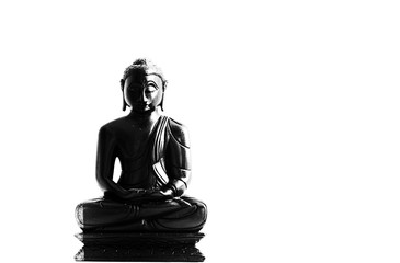 Sitting Buddha wearing colorful robes and having his legs crossed. His hands are pressed together...